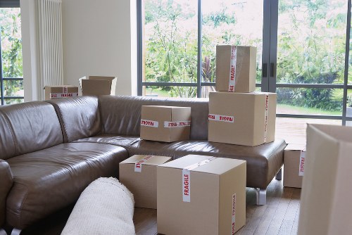 Professional movers handling furniture